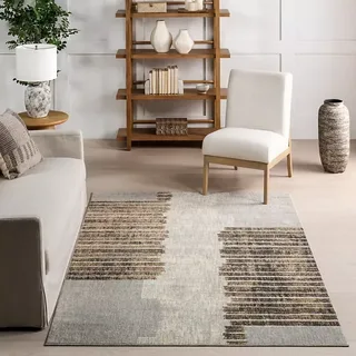 How to Place an 8×11 Rug in a Living or Dining Room